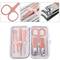 Kit d'estoig de manicura i pedicura professional, set de 7 accessoris d’acer inoxidable, color Or rosa