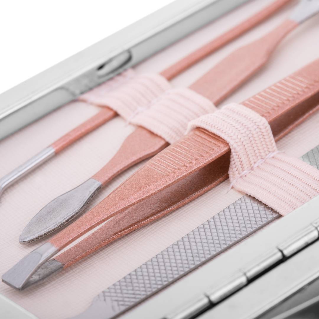 Kit d'estoig de manicura i pedicura professional, set de 7 accessoris d’acer inoxidable, color Or rosa