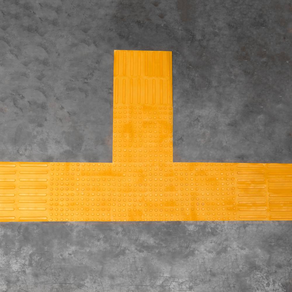 Pavimento tattile per non vedenti 40x40cm con cerchi di arresto e allarme giallo 10-pack