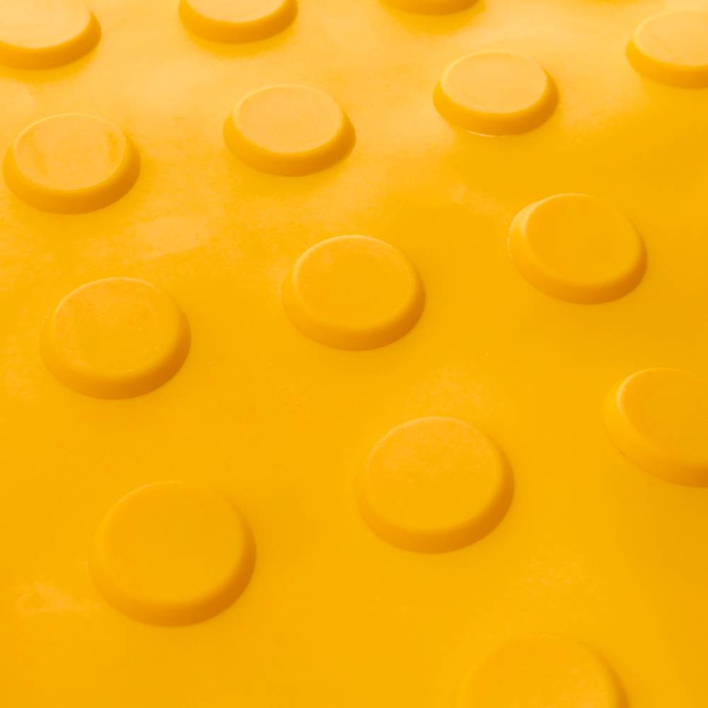 Pavé revêtement de sol tactile pour personnes aveugles 25x25cm avec cercles d'arrêt jaune 10-pack