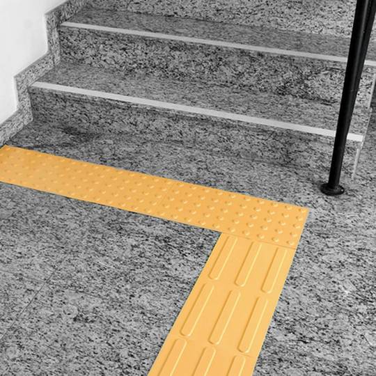 Pavé revêtement de sol tactile pour personnes aveugles 25x25cm avec cercles d'arrêt jaune 10-pack