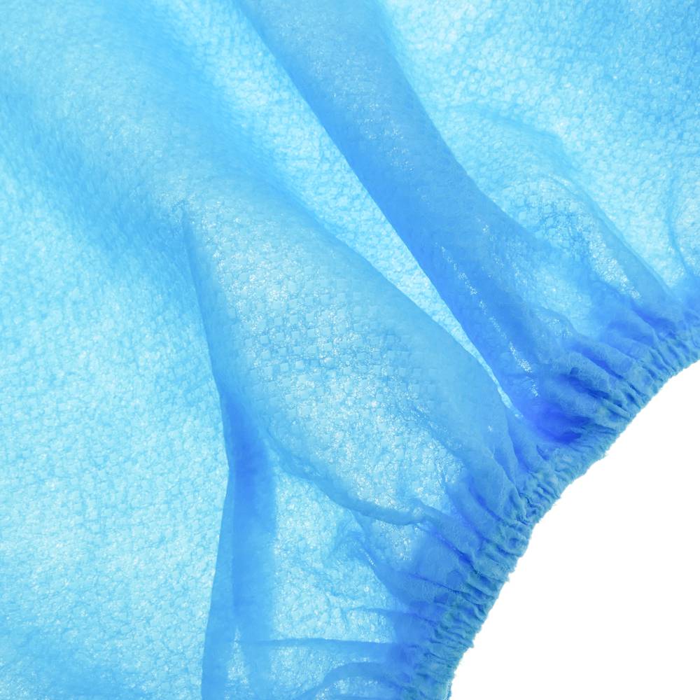 Wegwerp overschoenen voor bescherming. Set van 100 textielhoezen