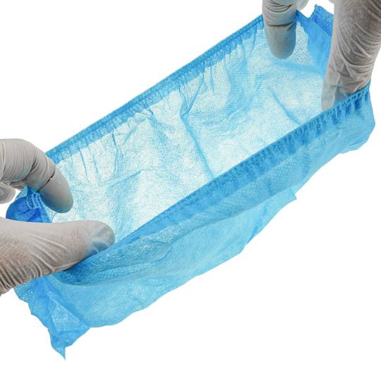 Wegwerp overschoenen voor bescherming. Set van 100 textielhoezen