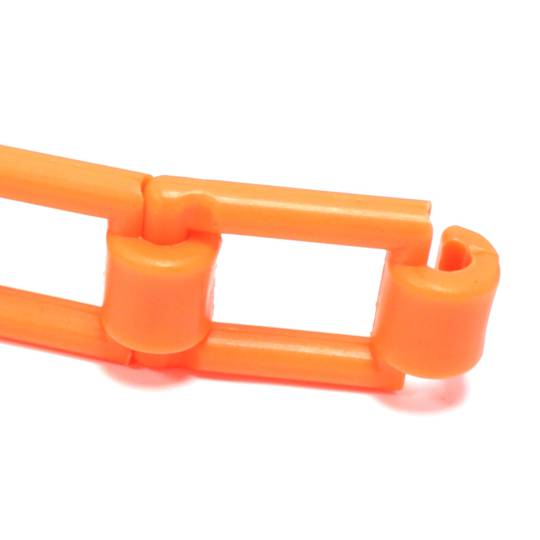 Cadena de plàstic taronja per enrotllador de fons d'estudi fotogràfic