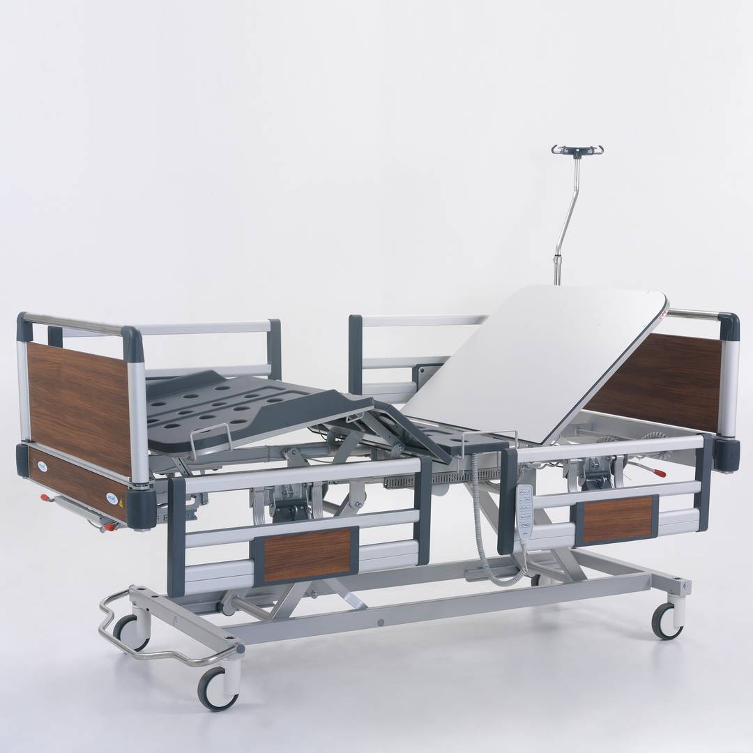Four motor Nitrocare HB 4230 patient hospital bed with ABS lying surface