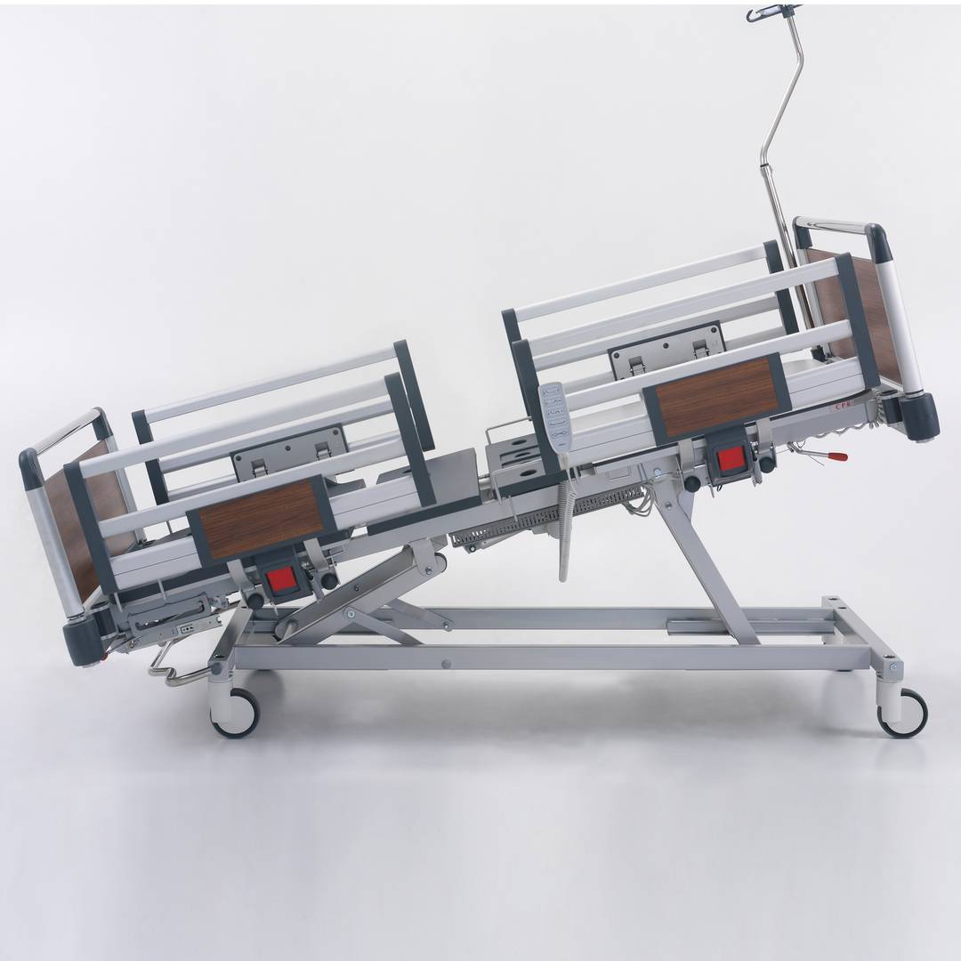 Four motor Nitrocare HB 4230 patient hospital bed with ABS lying surface