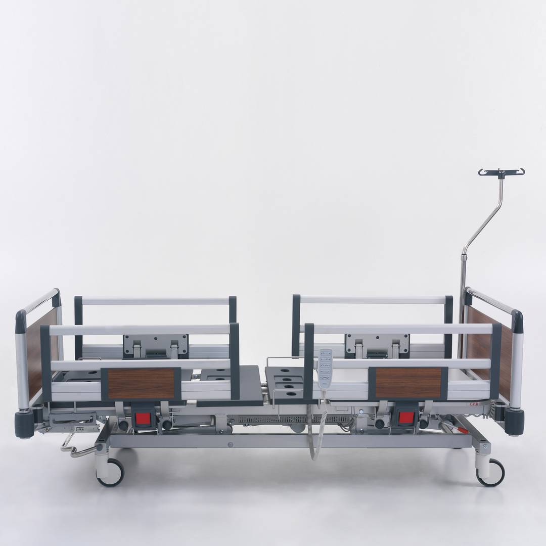 Four motor Nitrocare HB 4230 patient hospital bed with ABS lying surface
