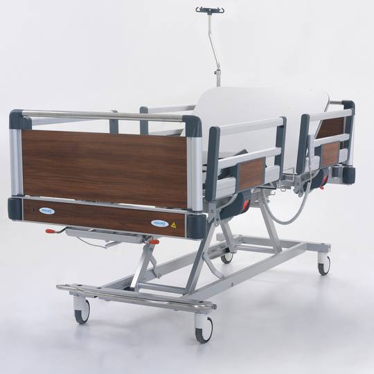 Four motor Nitrocare HB 4230 patient hospital bed with ABS lying surface