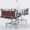 Four motor Nitrocare HB 4230 patient hospital bed with ABS lying surface