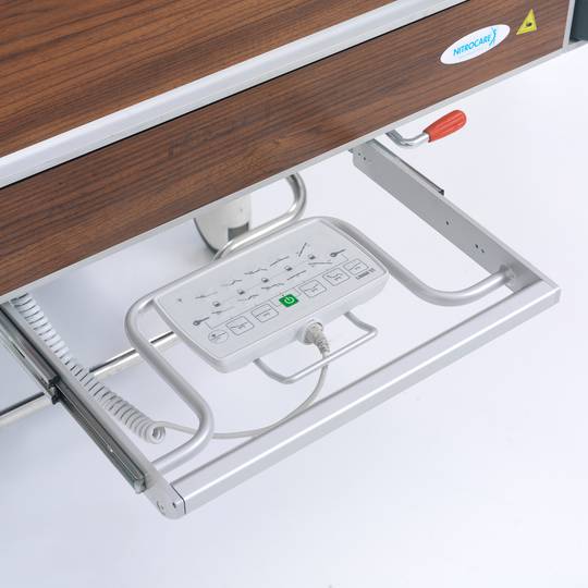 Four motor Nitrocare HB 4230 patient hospital bed with ABS lying surface