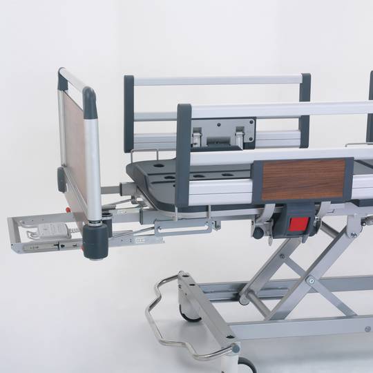Four motor Nitrocare HB 4230 patient hospital bed with ABS lying surface