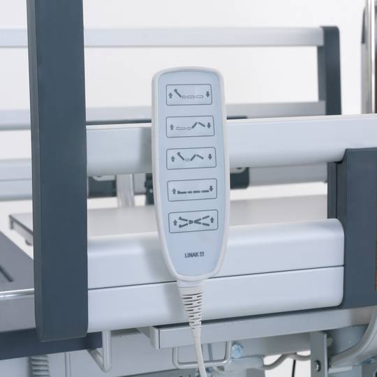 Four motor Nitrocare HB 4230 patient hospital bed with ABS lying surface