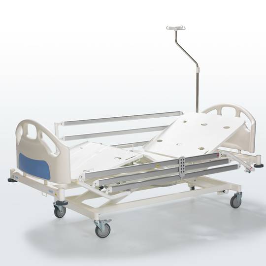 Four-motor Nitrocare HB 6630 patient hospital bed with metal lying surface