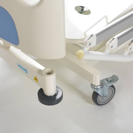 Four-motor Nitrocare HB 6630 patient hospital bed with metal lying surface