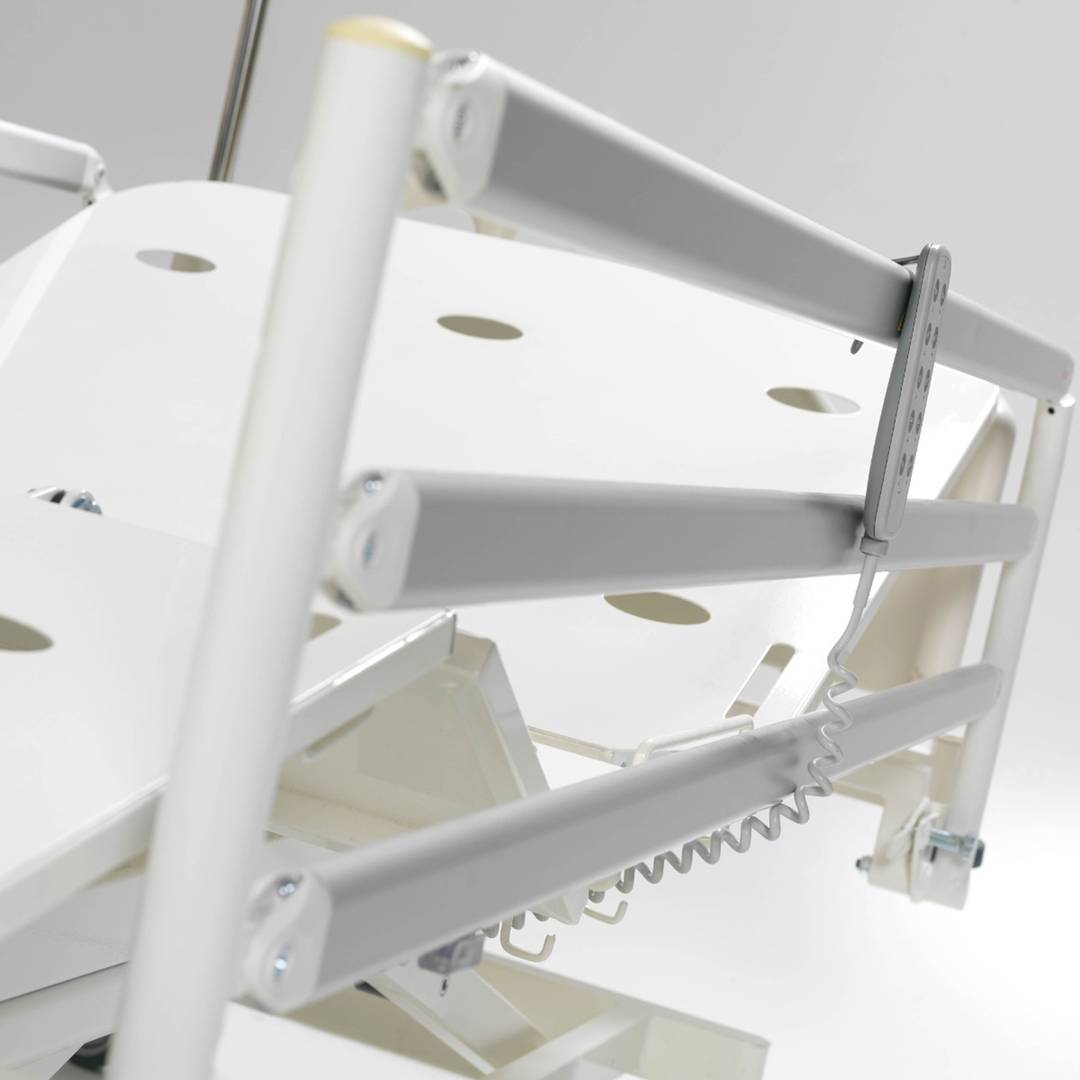 Four-motor Nitrocare HB 6630 patient hospital bed with metal lying surface