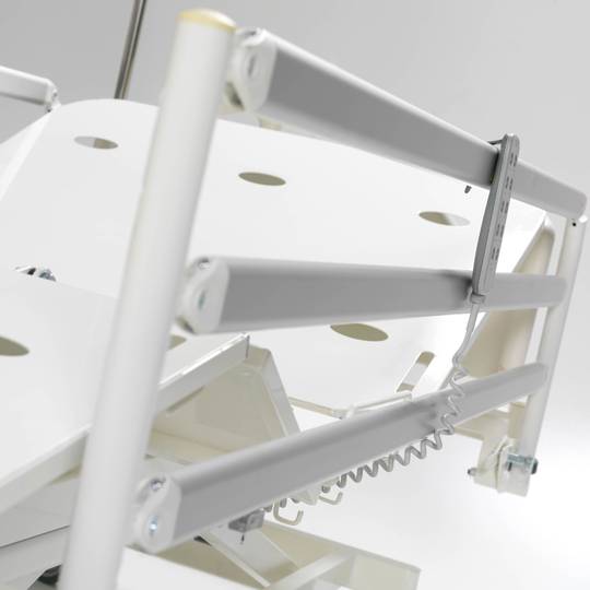 Four-motor Nitrocare HB 6630 patient hospital bed with metal lying surface