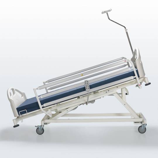 Four-motor Nitrocare HB 6630 patient hospital bed with metal lying surface