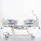 Nitrocare HB 3350 three-motor hospital bed with metal lying surface
