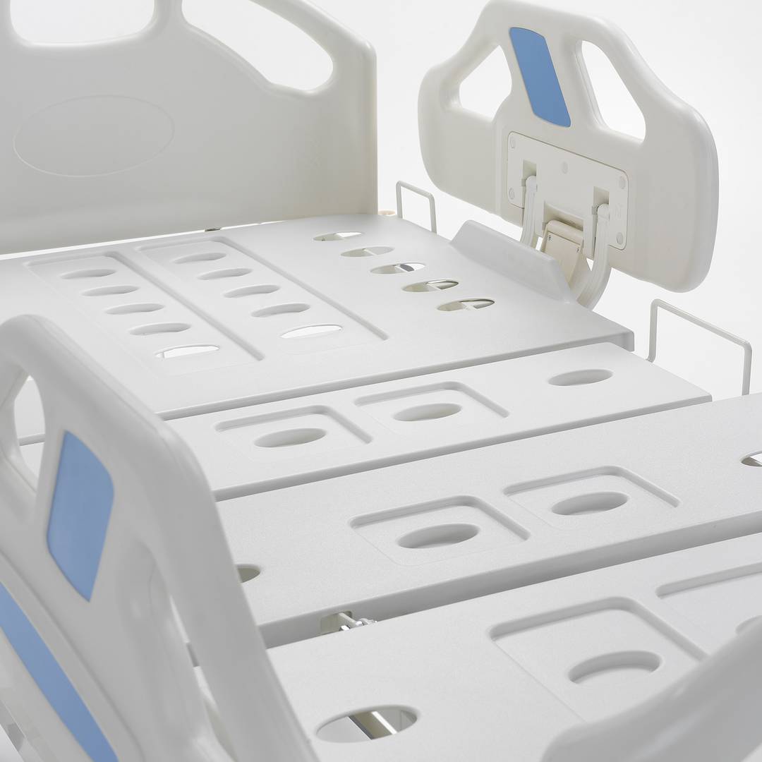Nitrocare HB 3350 three-motor hospital bed with metal lying surface