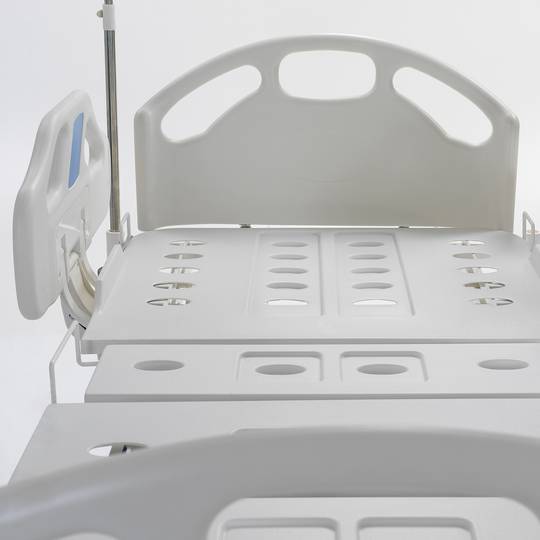 Nitrocare HB 3350 three-motor hospital bed with metal lying surface