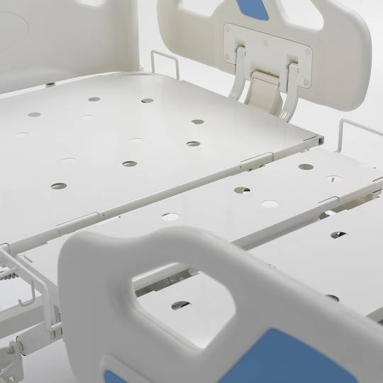 Nitrocare HB 3350 three-motor hospital bed with metal lying surface