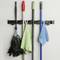 Holder for mop, broom and brush. Wallmount rack organizer with 4 positions and 5 hooks