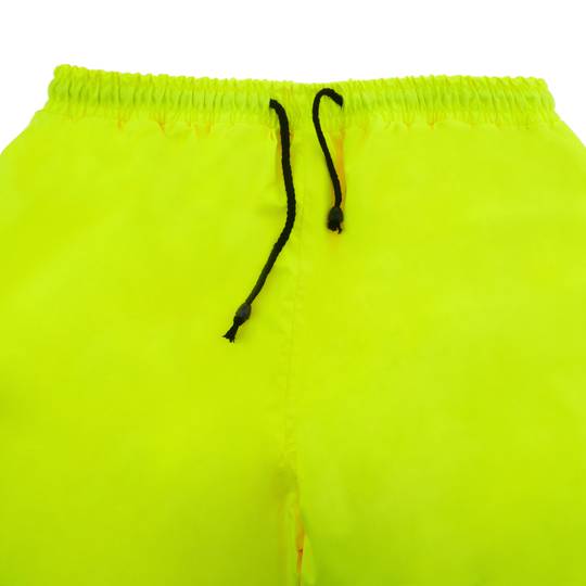 Spodnie robocze z żółtym odblaskiem dla bezpieczeństwa pracy rozmiar L.