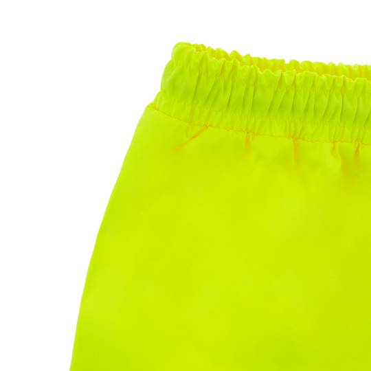 Spodnie robocze z żółtym odblaskiem dla bezpieczeństwa pracy rozmiar L.