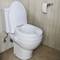 Raised toilet seat for WC with cap for adults