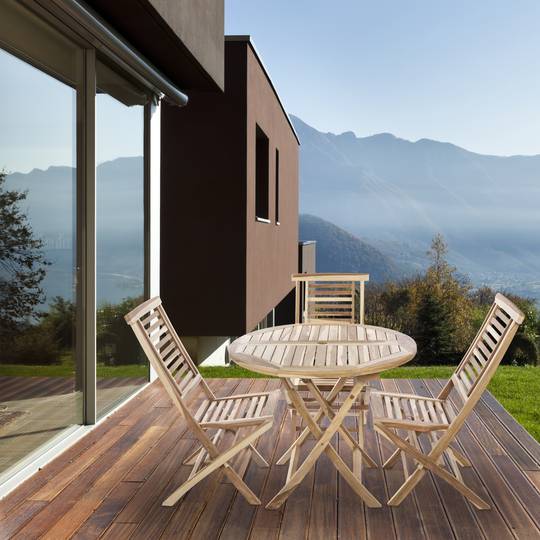 Mesa redonda extensible para terraza cubierta de exterior en madera