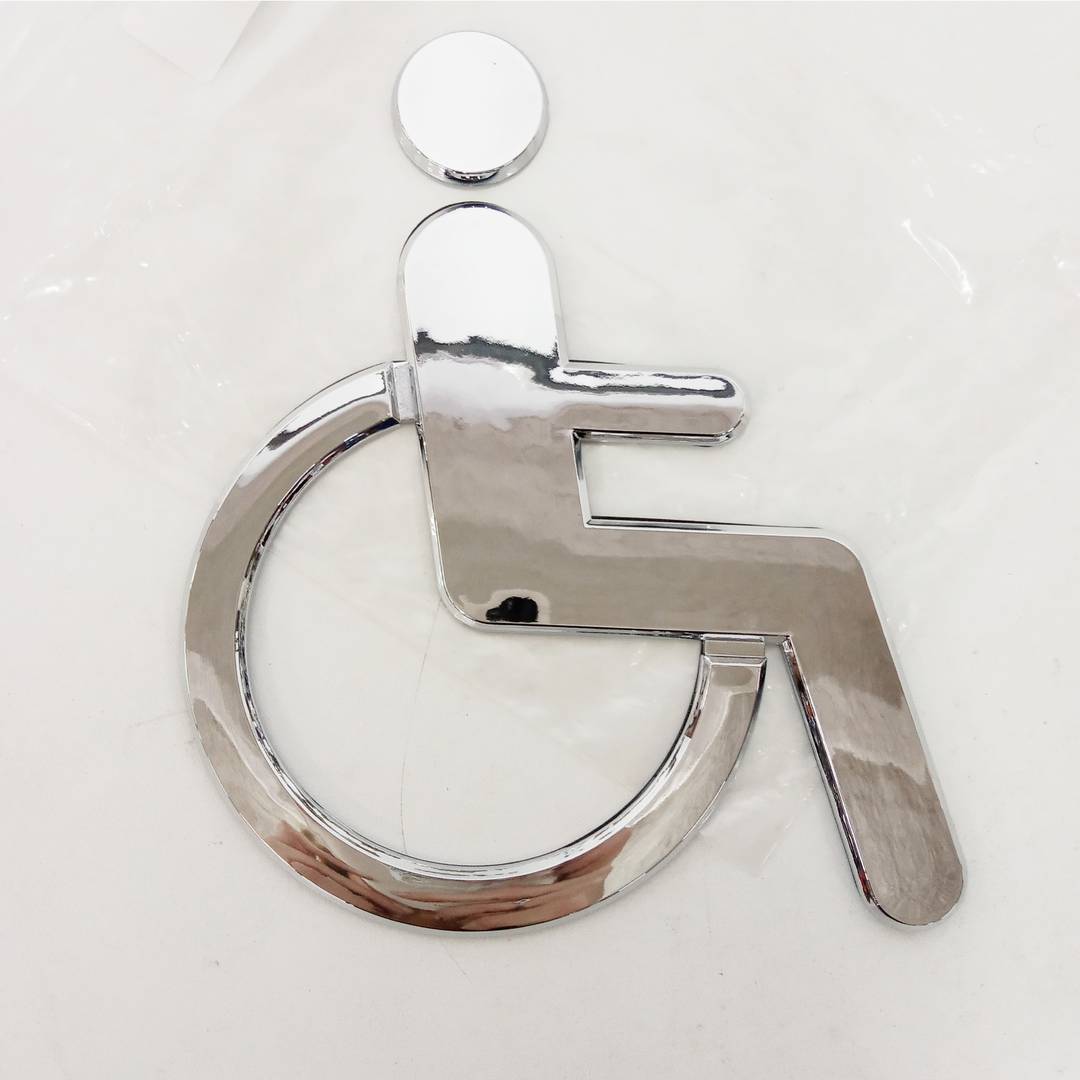 Metalowa wytłoczona naklejka dla niepełnosprawnych w łazience