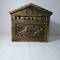 Antique cast iron mailbox for letters and postal mail in rust color birds
