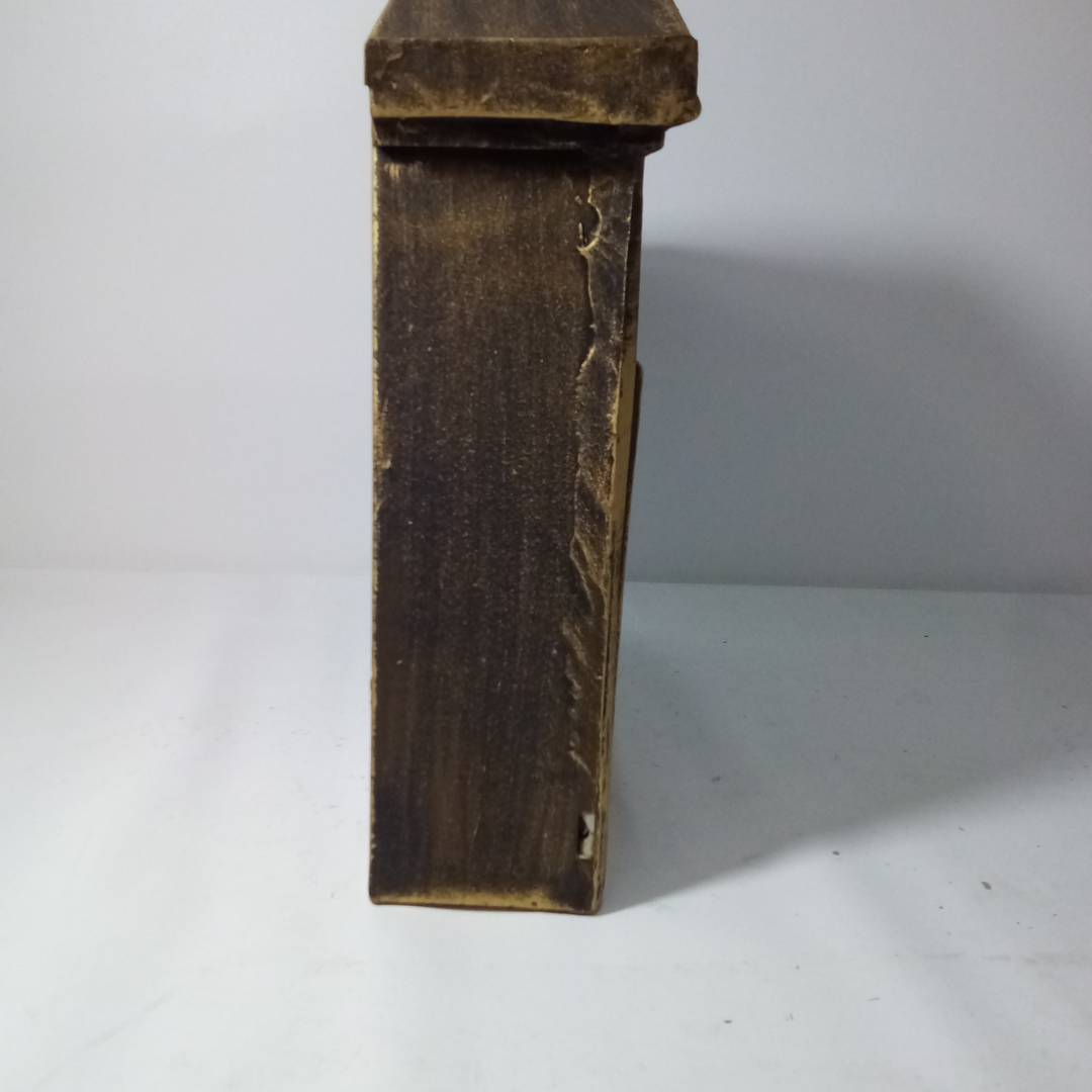 Antique cast iron mailbox for letters and postal mail in rust color birds