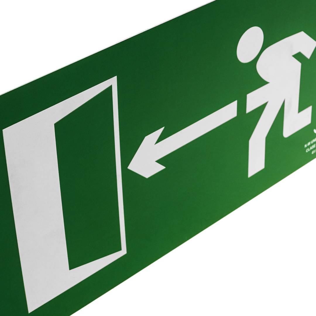 Emergency exit sign to the left. Luminescent signal 32 x 16 cm