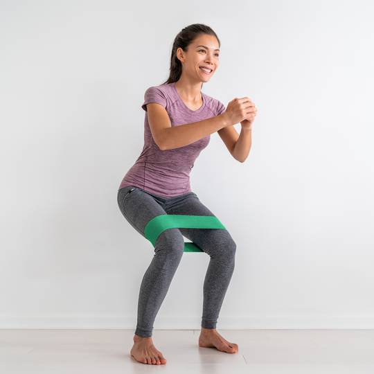 Banda fitness de tecido resistente de 9 kg verde