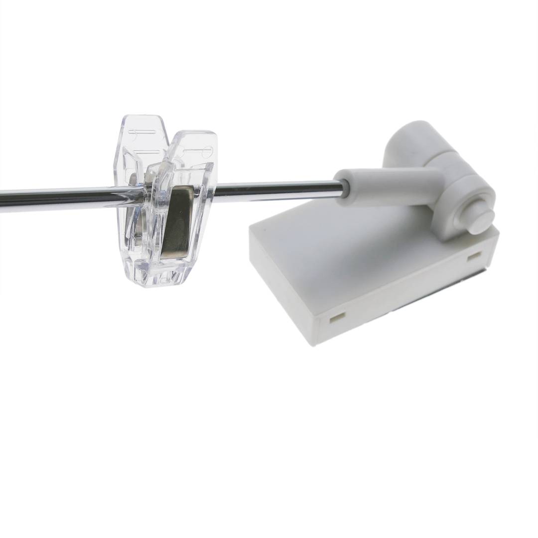 Magnetic holder for a poster or advertisement with rotation