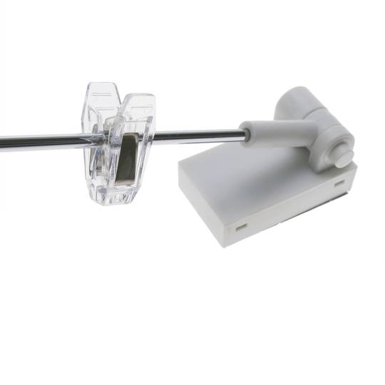 Magnetic holder for a poster or advertisement with rotation